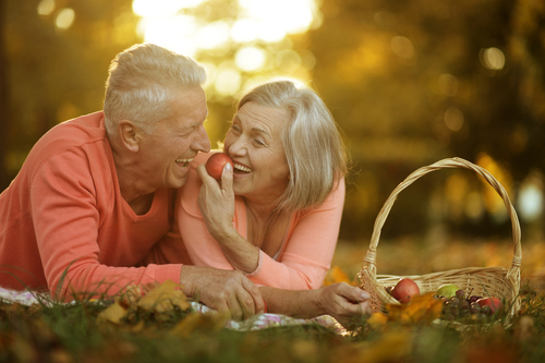 couple with implant supported dentures